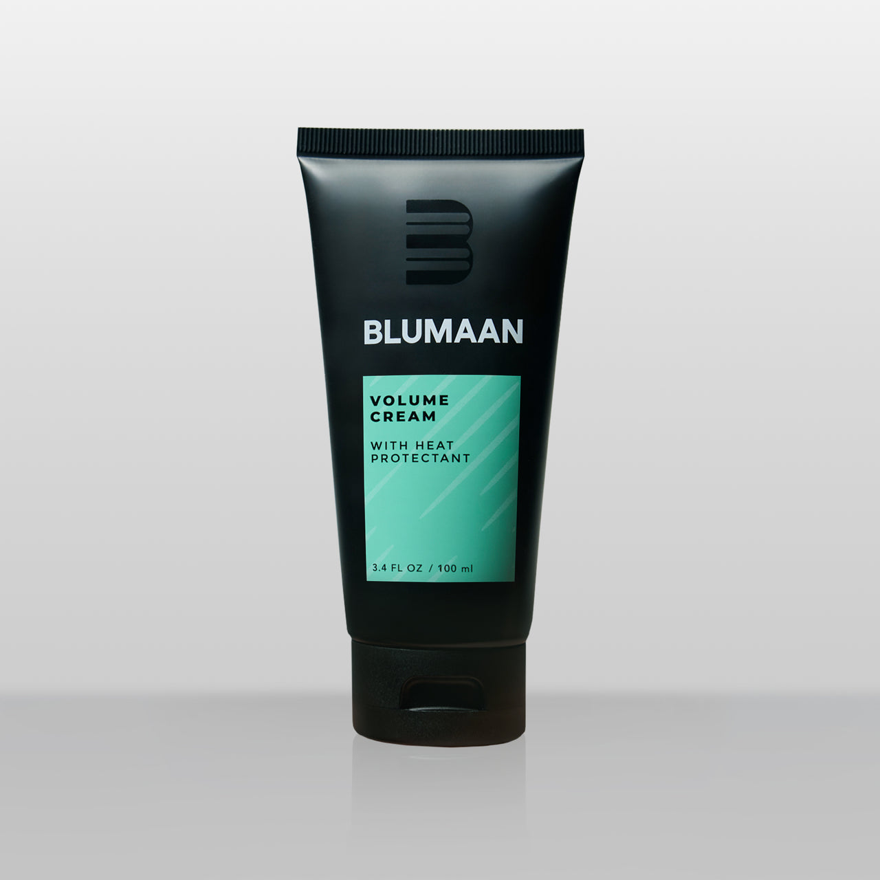 BLUMAAN Volume Cream product tube displayed on minimal gray background showing modern packaging design